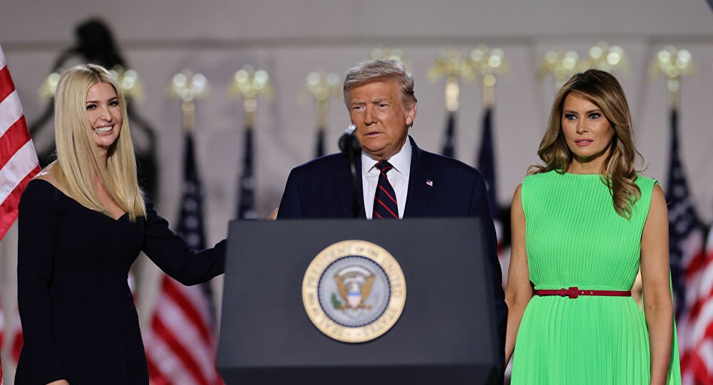U.S. President Donald Trump looks on alongside to U.S. first lady Melania Trump and White House Senior Adviser Ivanka Trump before delivering his acceptance speech as the 2020 Republican presidential nominee during the final event of the Republican National Convention on the South Lawn of the White House in Washington, U.S., August 27, 2020. REUTERS/Carlos Barria